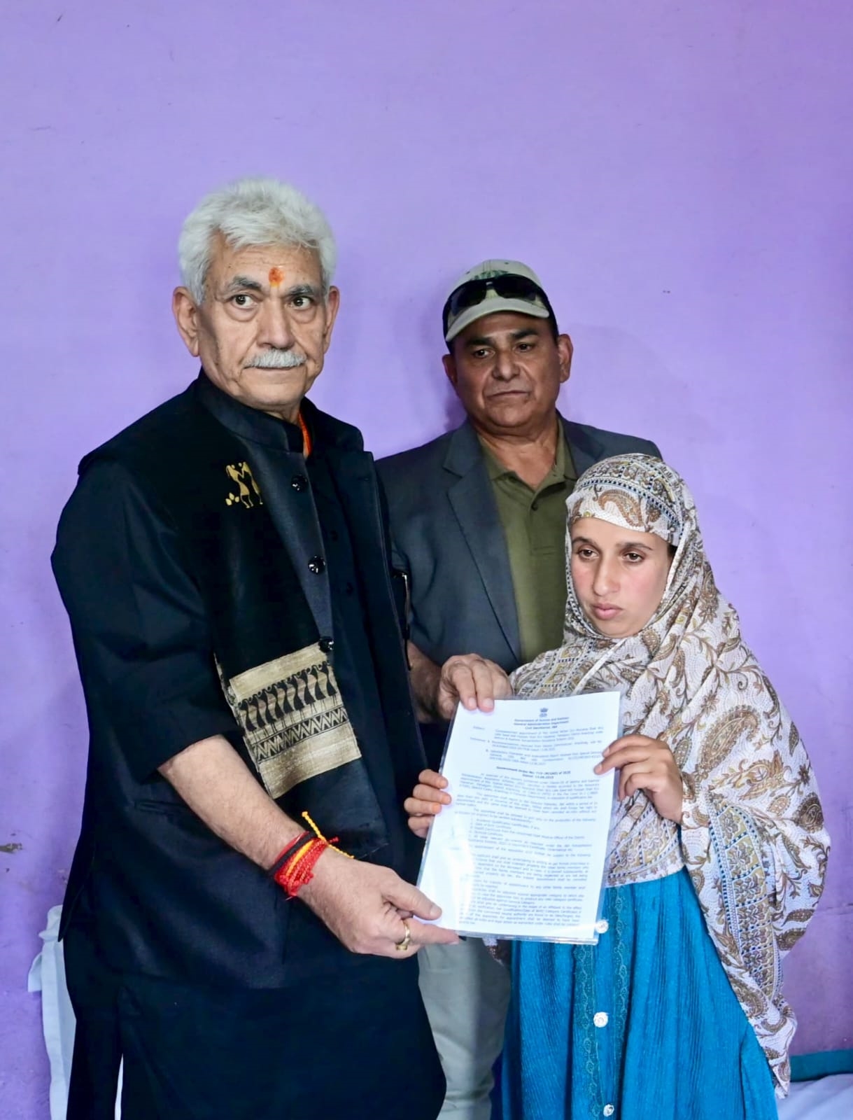 'LG Sinha meets family of martyr Syed Adil Hussain at Anantnag, hands over appointment letter to his wife on compassionate ground'